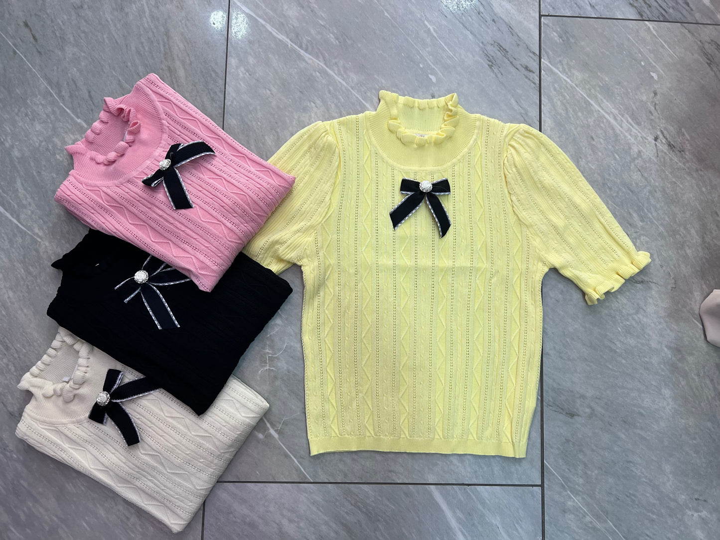 Maglia filo fiocco mezza manica
